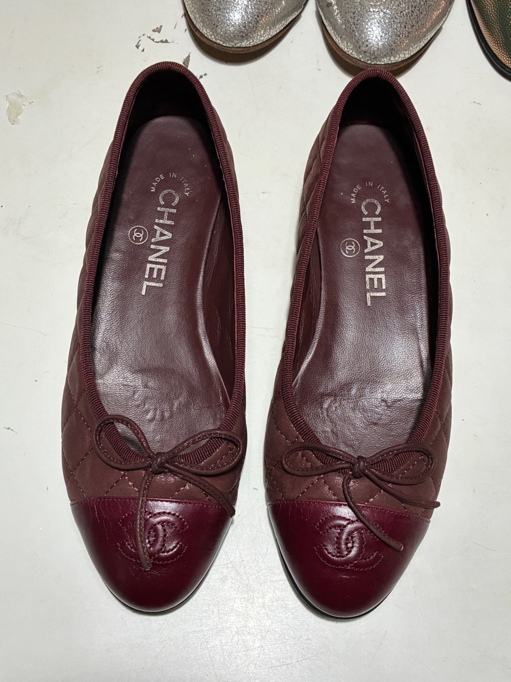 CHANEL Burgundy Quilted Ballet Flats with Cap Toe